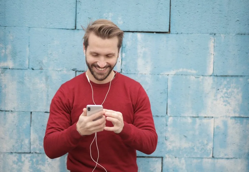 Person reviewing life insurance options on phone.