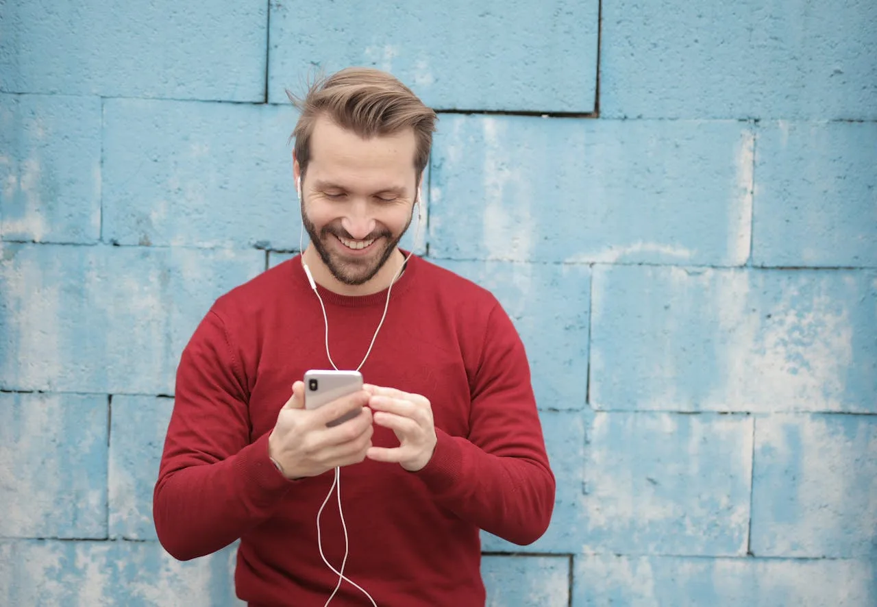 Person reviewing life insurance options on phone.