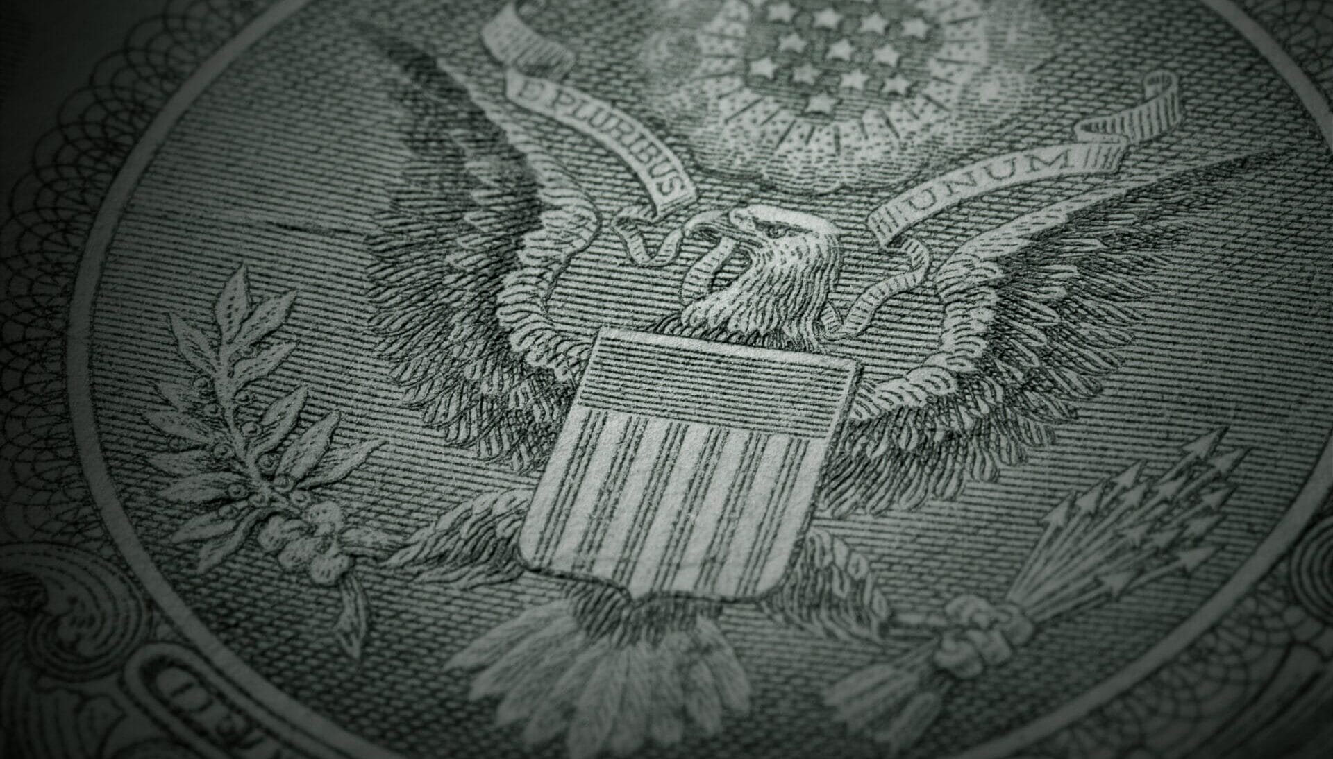 Macro shot of the Great Seal of the U.S. on the back of the one dollar bill